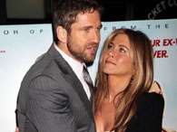 Gerard Butler e Jennifer Aniston eram s� romance no tapete vermelho. Foto: Getty Images