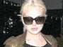 Lindsay Lohan andou pelas ruas de Los Angeles com uma blusa transparente e sem suti�. Foto: Grosby Group