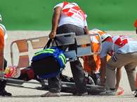 Piloto japon�s, de apenas 19 anos, morre ap�s acidente com tr�s motos no GP de San Marino. Foto: AFP
