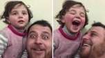 Sírio incentiva filha a rir para se distrair durante bombardeio em ofensiva do governo sobre última área rebelde