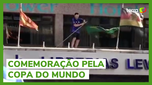 Argentinian fans tear the Brazilian flag from a pole during a party in Buenos Aires