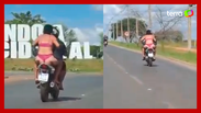 Mulher &eacute; flagrada apenas com roupas &iacute;ntimas em garupa de moto em Goi&aacute;s