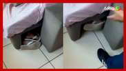 The outlaw hides under the sofa and leaves his foot outside is arrested in ES