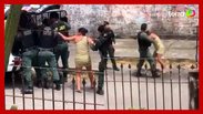 A police officer caught punching and kicking a woman in Fortaleza