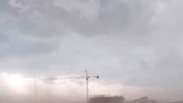 What is hidden behind the thick smoke covering Manaus?