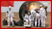 Astronautas chineses voltam à Terra após seis meses no espaço