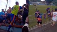 Duke of Caxias players jump a fence and start from the fans after relegation to RJ