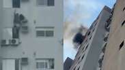 Mulher se pendura em prédio para salvar mãe e criança de apartamento em chamas no Paraná