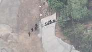 Police drone captured armed men fleeing in woods ahead of mega-operation in RJ