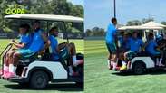 Jogadores se aglomeram e pegam carona em carrinho de golfe em treino da Sele&ccedil;&atilde;o