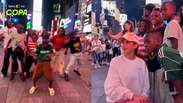Crian&ccedil;as de Uganda dan&ccedil;am na Times Square dias antes de se apresentar com Shakira na final da Copa