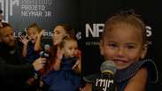Mavie rouba a cena com dancinha durante entrevista de Neymar em leil&atilde;o