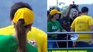 Esposa de Fl&aacute;vio Bolsonaro discursa e escreve &lsquo;O Brasil vai vencer&rsquo; com batom nas costas dele