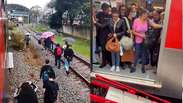 Passageiros caminham pelos trilhos e usam &lsquo;prancha&rsquo; para transfer&ecirc;ncia entre trens ap&oacute;s pane na Linha 12 da CPTM
