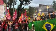 Apoiadores de Lula e Fl&aacute;vio Bolsonaro se aglomeram na frente da Band antes de debate; veja
