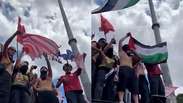 Manifestantes queimam bandeira dos EUA durante ato a favor de Lula em S&atilde;o Paulo