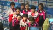 Equipes coreanas se unem durante mundial de tênis de mesa