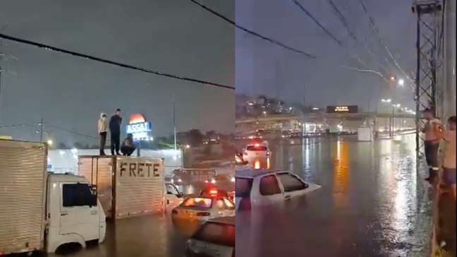 Motoristas se abrigam em cima de caminhão após chuva alagar trecho da Dutra no RJ
