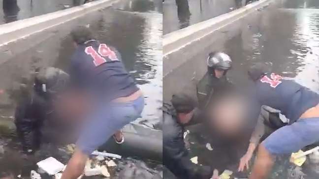 Motociclista salva idoso após queda em canal durante enchente no litoral de SP