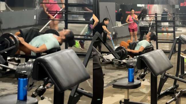 Mulher ignora alagamento e continua treinando em academia na Bahia