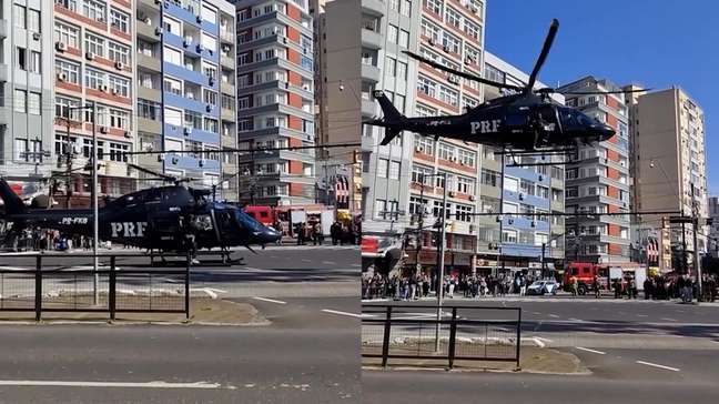 Helicóptero pousa no meio de avenida e impressiona moradores em Porto Alegre