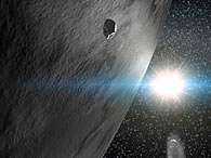 Concepção artística do asteróide 24 Themis com dois outros pequenos asteróides ao seu lado. Foto: Gabriel Pérez, Instituto de astrofísica de Canárias/Divulgação
